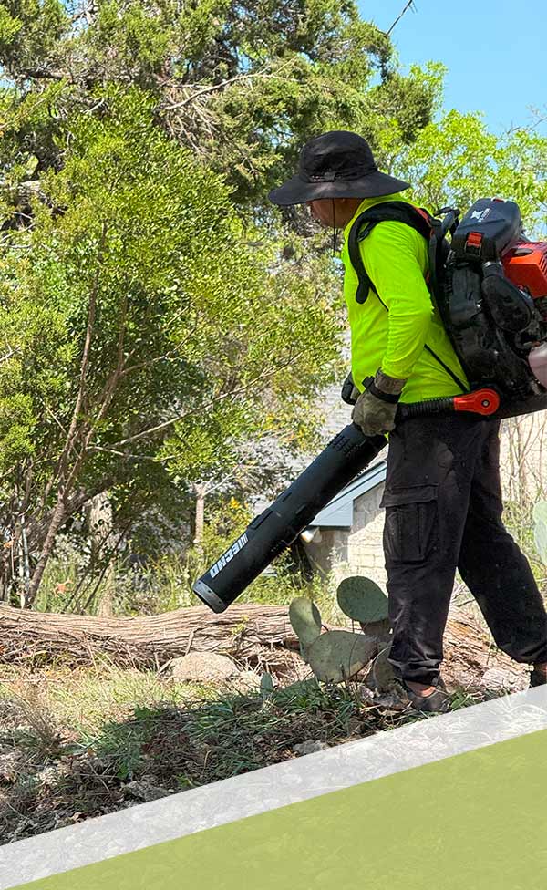 Blowing Leaves at an HOA Landscaping Project Site
